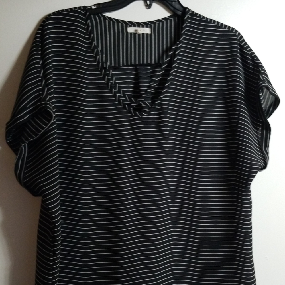 Black blouse with white stripes